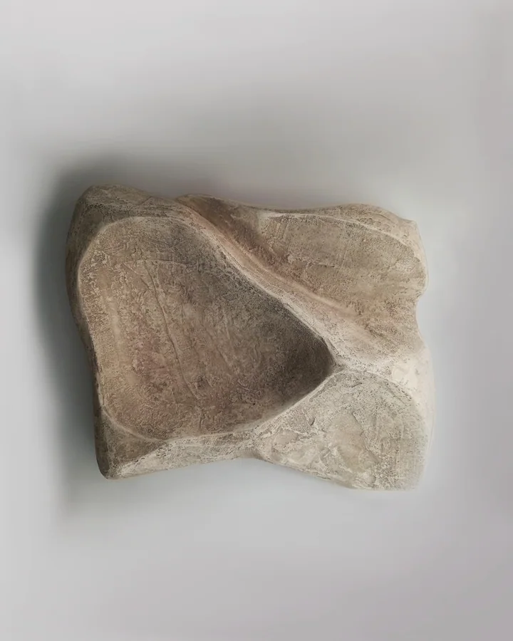 Curl, handmade cement wall sculpture